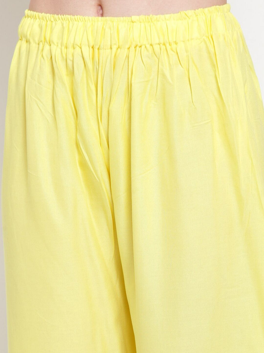 TAG 7 Women Yellow Solid Flared Ethnic Palazzos | Grocsy