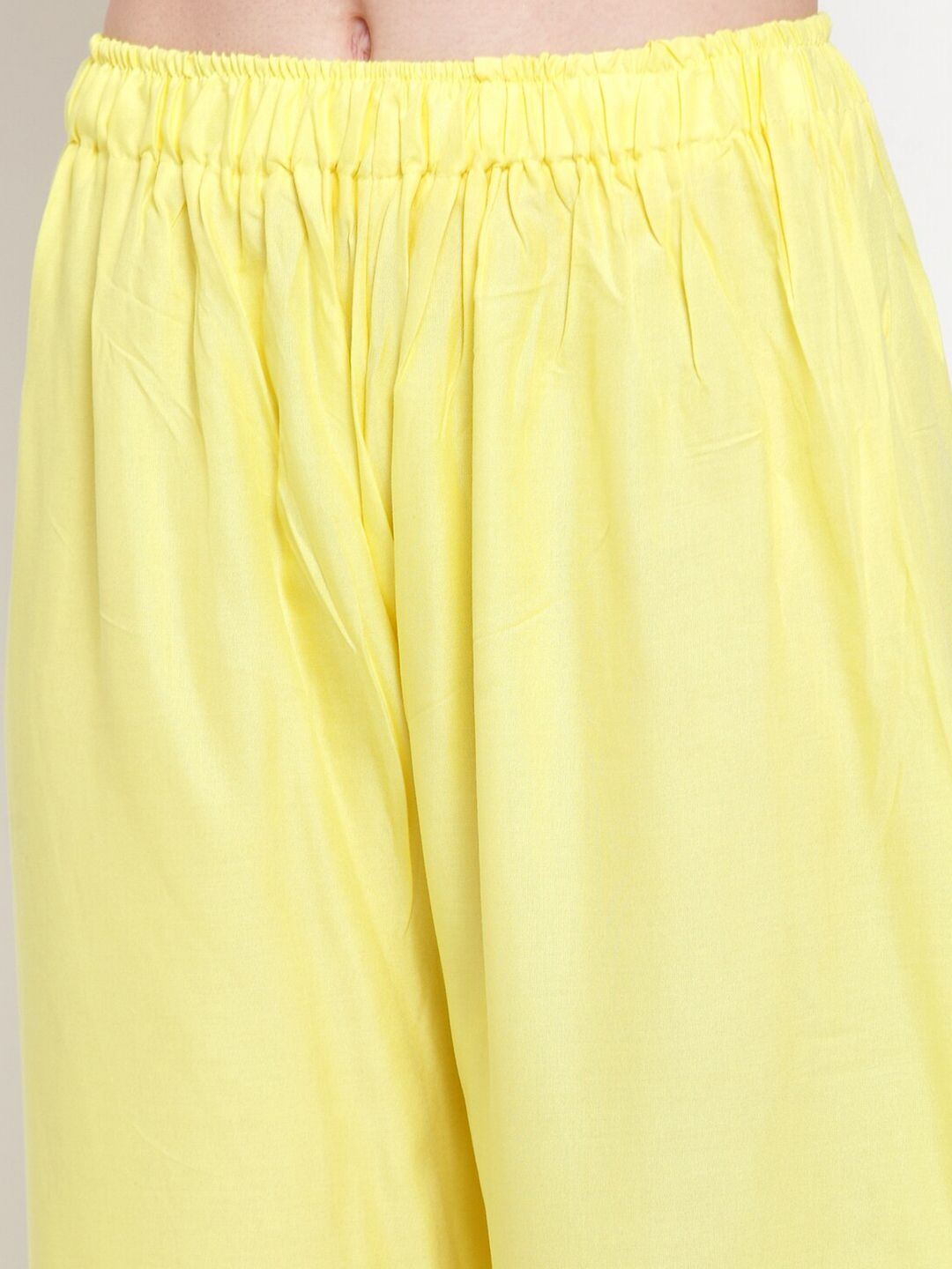 TAG 7 Women Yellow Solid Flared Ethnic Palazzos | Grocsy