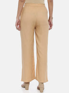 Souchii Beige Solid Flared Palazzos | Grocsy