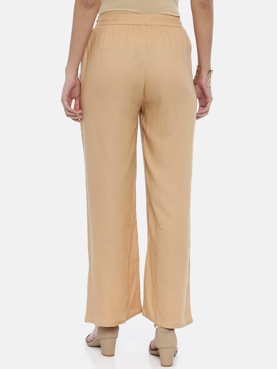 Souchii Beige Solid Flared Palazzos | Grocsy