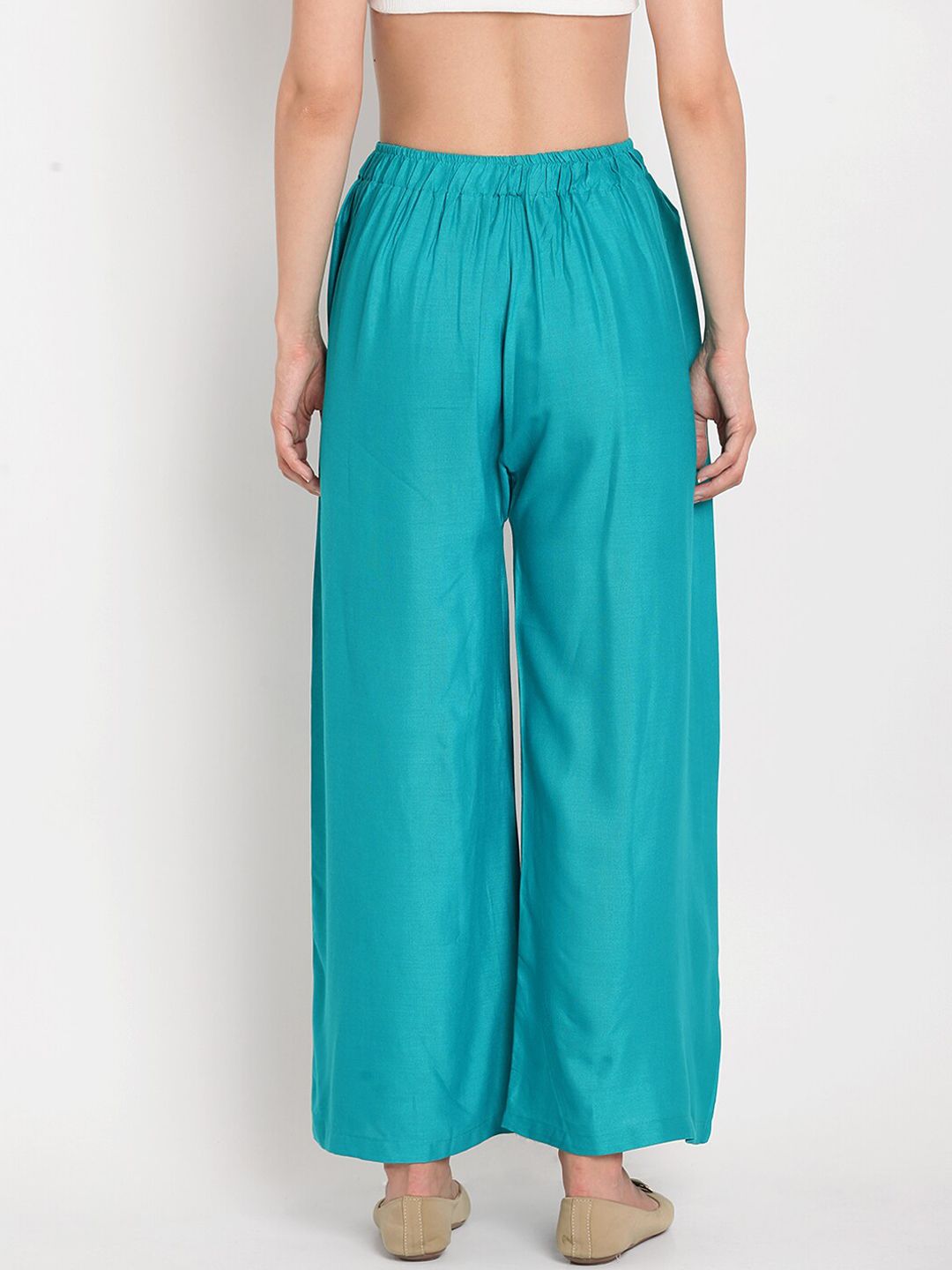 TAG 7 Women Turquoise Blue Solid Flared Palazzos | Grocsy