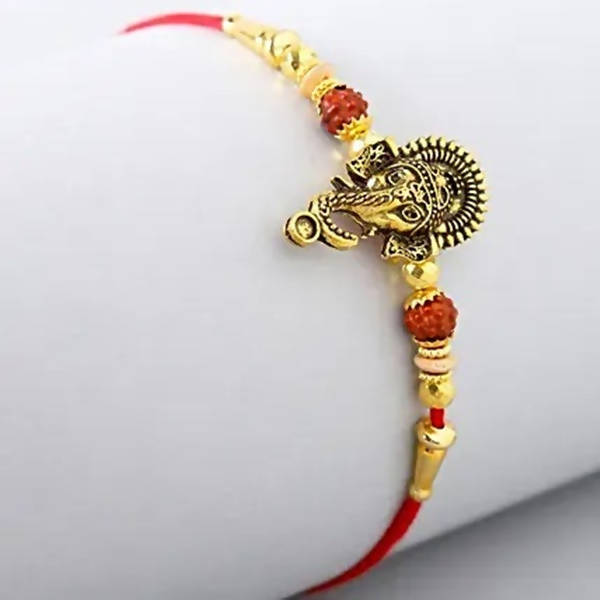 Lord Ganesha Rudraksha Rakhi & Almonds | Grocsy