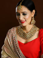 Gold-Polished Maharani Kundan Neckpiece With Earrings And Maang Tikka - Ruby Raang | Grocsy