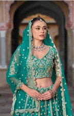 Anaita Turquoise Net Lehenga Choli With Stone Embroidery Work | Grocsy