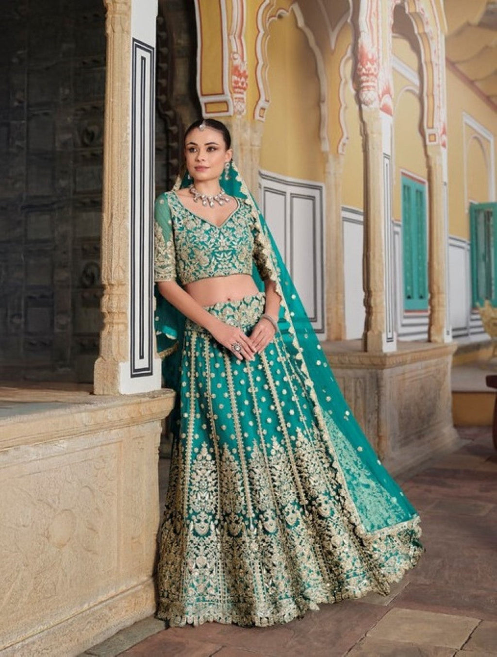 Anaita Turquoise Net Lehenga Choli With Stone Embroidery Work | Grocsy