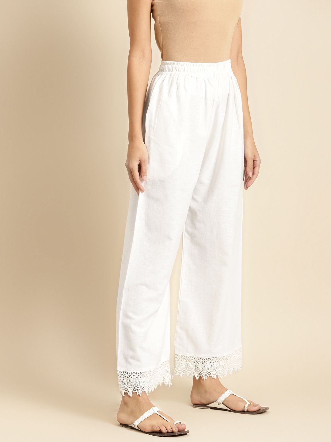 TAG 7 Women White Solid Hem Design Straight Palazzos | Grocsy