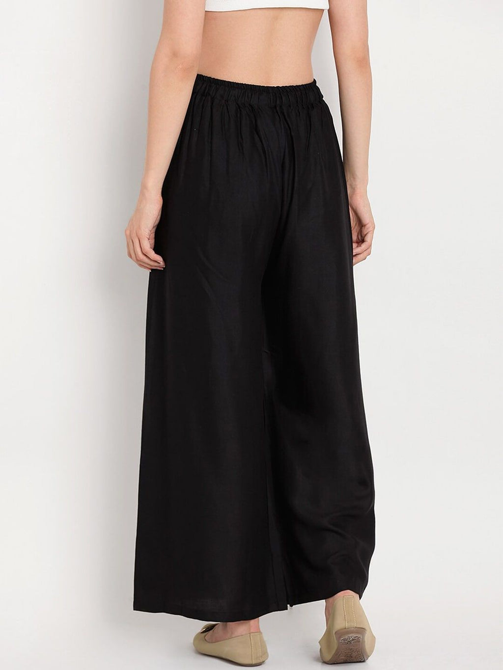 TAG 7 Women Black Solid Flared Palazzos | Grocsy