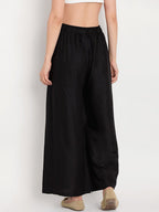 TAG 7 Women Black Solid Flared Palazzos | Grocsy