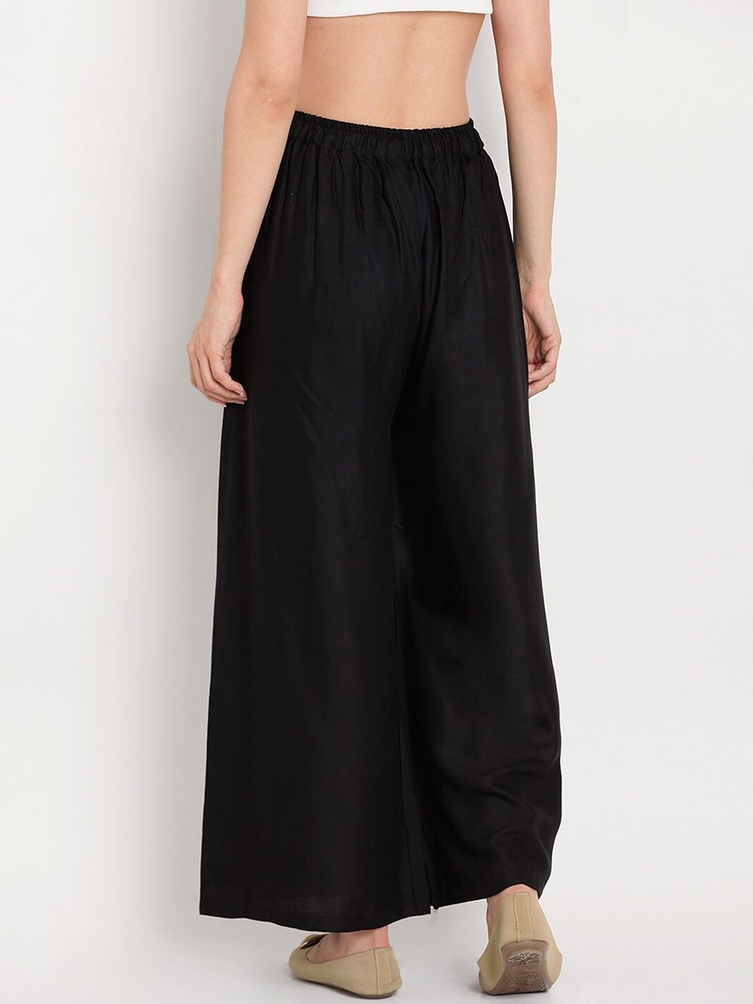 TAG 7 Women Black Solid Flared Palazzos | Grocsy