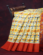 Shades of Cream Colour And Orange Blouse Patola Design Semi Chanderi Saree By Gayathri Reddy Designer Studio | Grocsy
