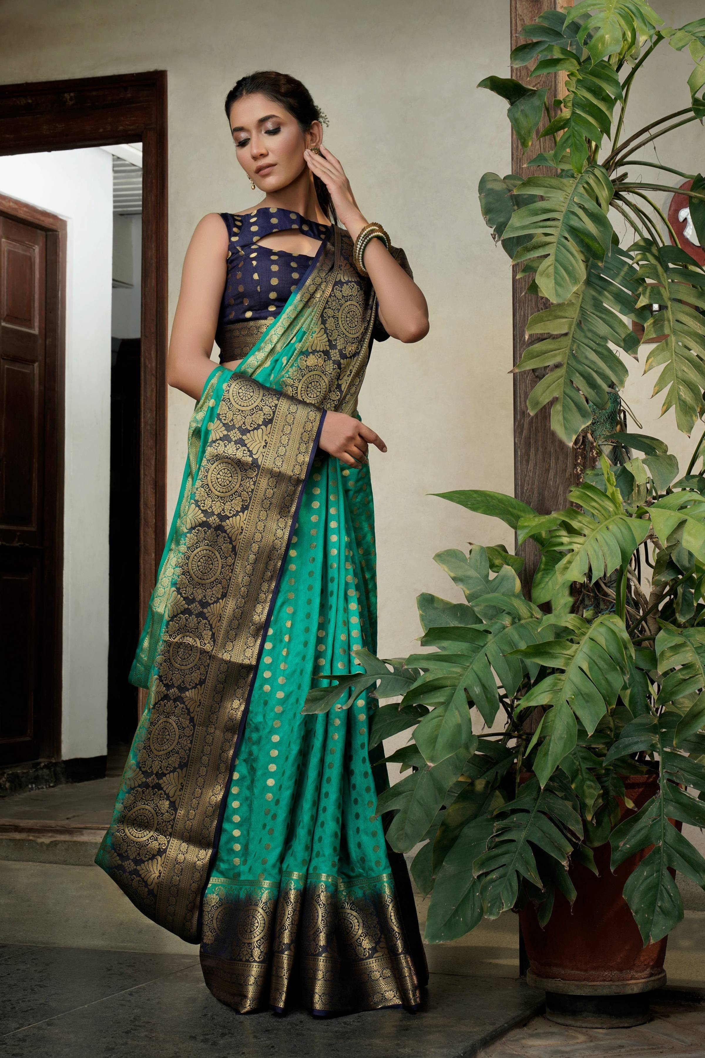Vardha Teal Green Golden Zari Banarasi Raw Silk Saree | Grocsy