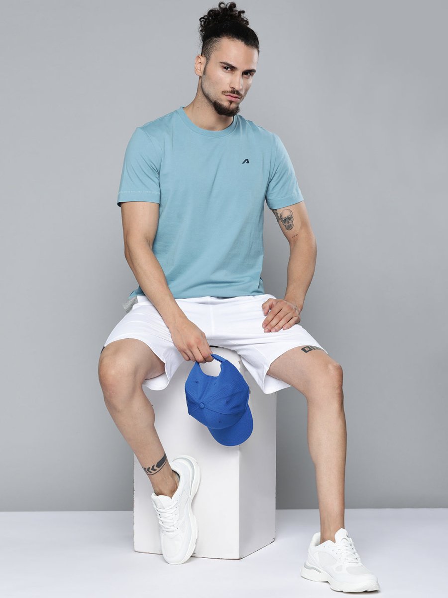 Alcis Men Blue Solid Slim Fit Gym T-shirt | Grocsy