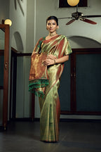 Vardha Olive Green Zari Work Kanjeevaram Silk Saree | Grocsy