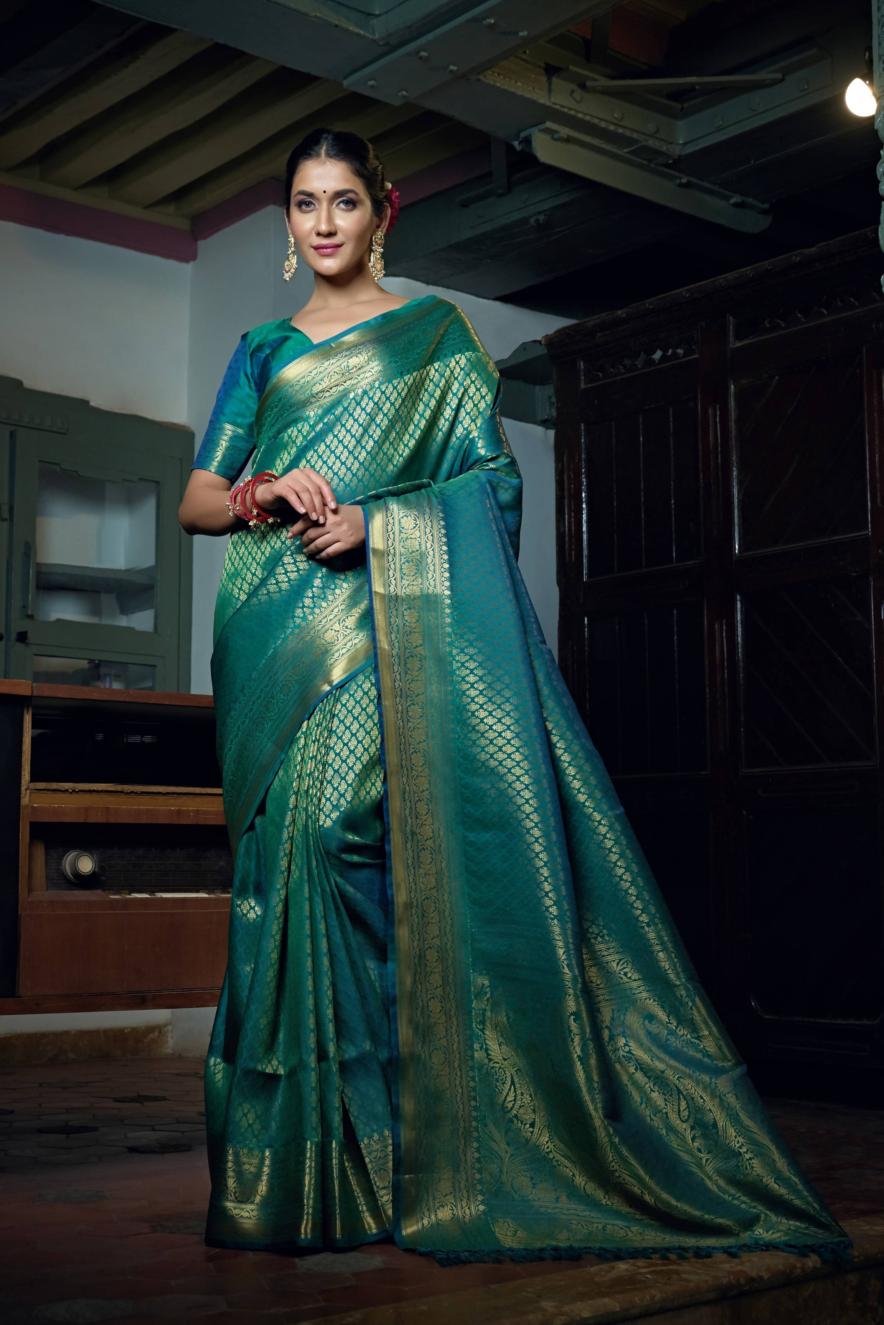 Vardha Teal Blue Golden Zari Kanjeevaram Silk Saree | Grocsy