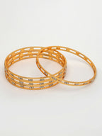 NVR Women's Set of 4 Gold-Polished CZ Stone-Studded Bangles