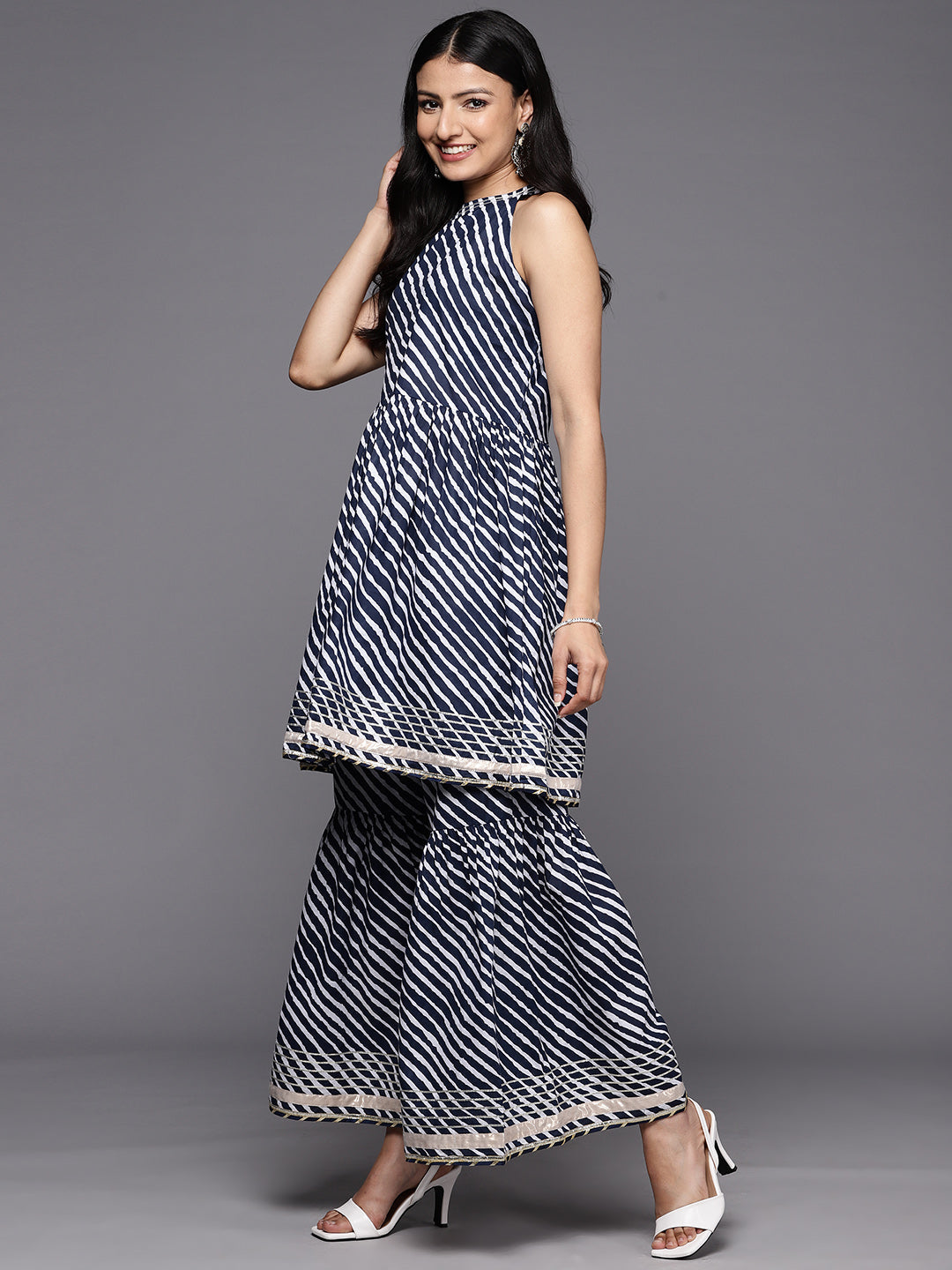 KSUT (House of Varanga) Blue And White Leheriya Halter Neckline Gota Work Kurta With Sharara | Grocsy
