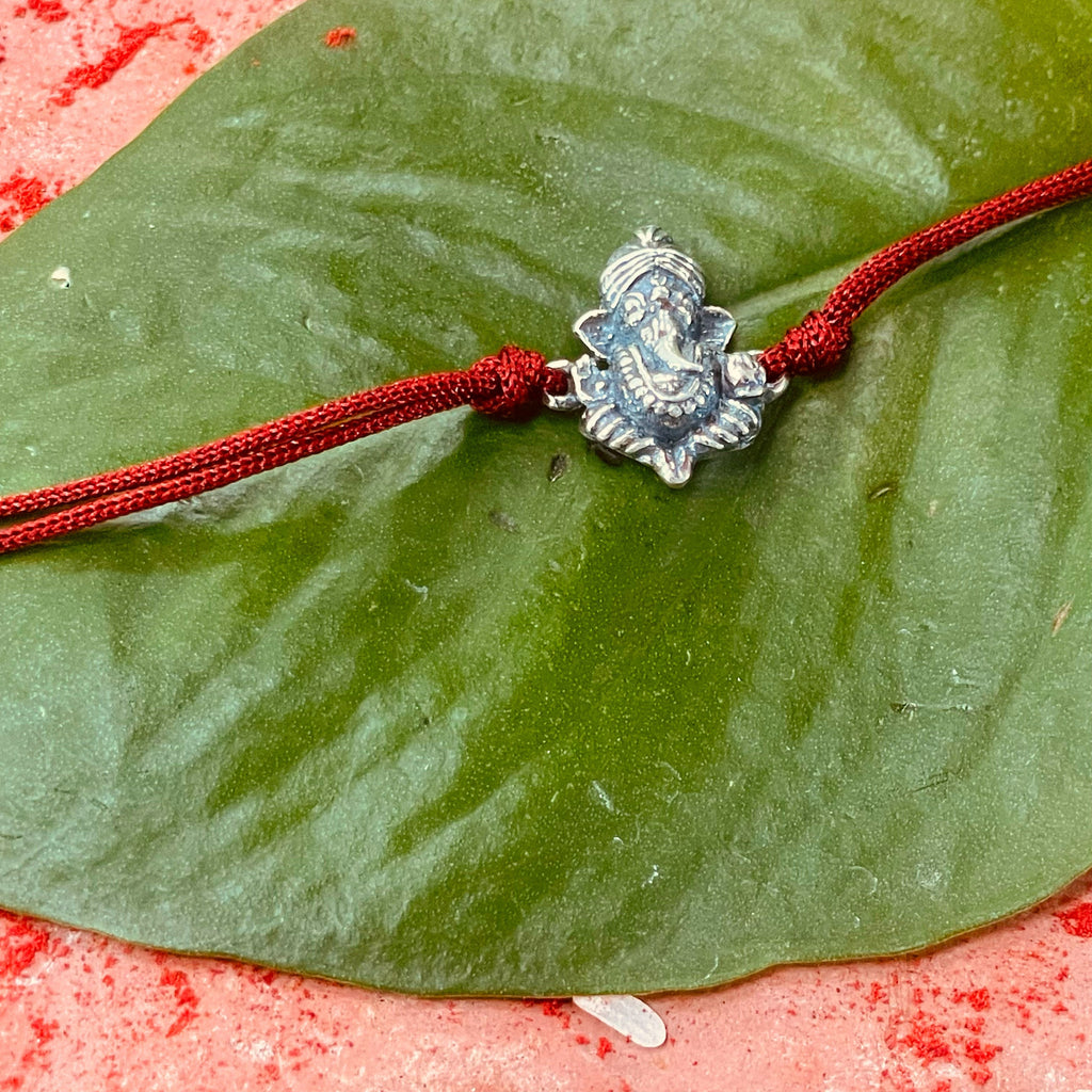 trueBrowns 925 Sterling Silver Lord Ganesh Idol Thread Rakhi | Grocsy