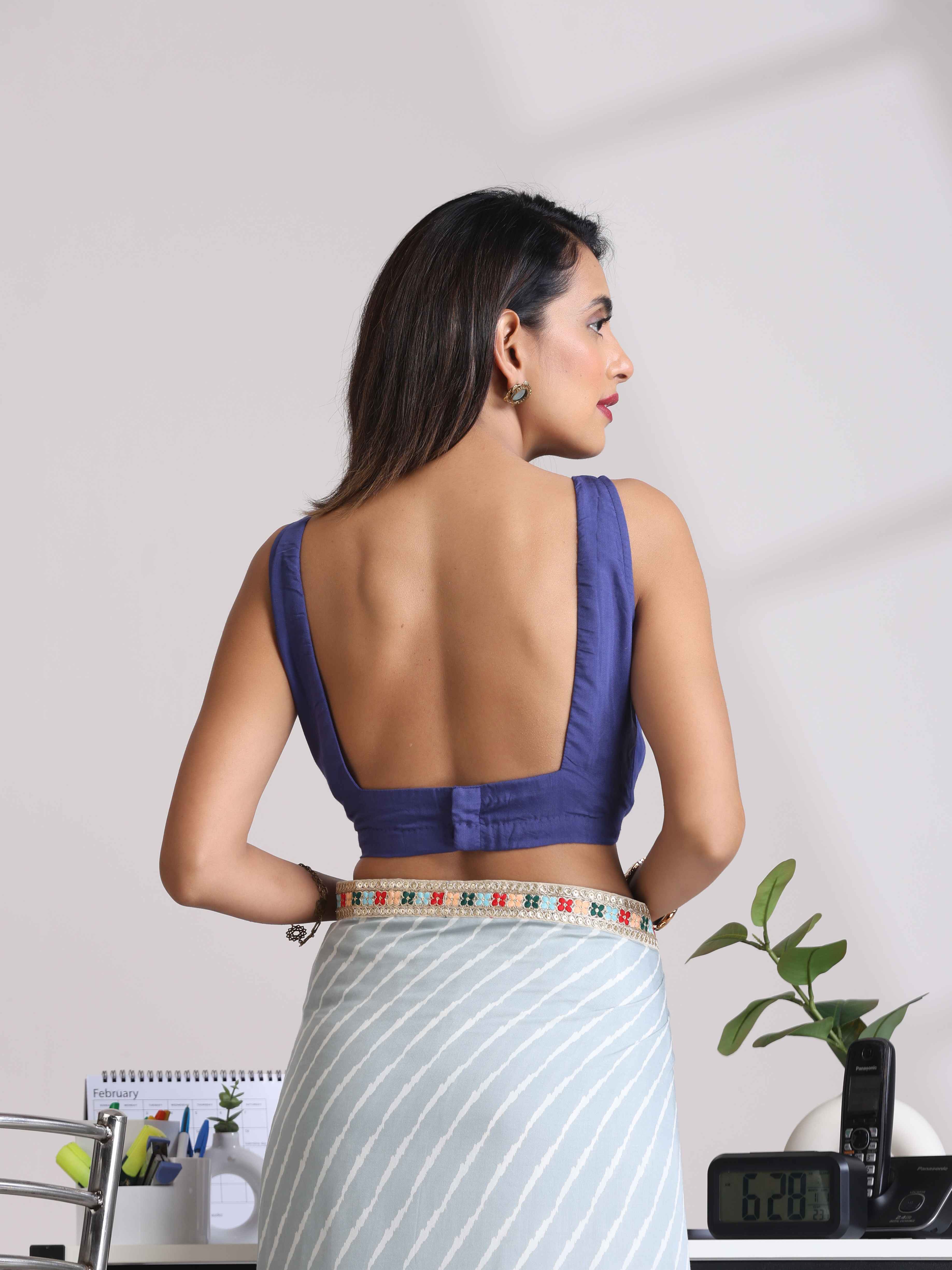 trueBrowns Blue Muslin Solid Sleeveless Blouse | Grocsy