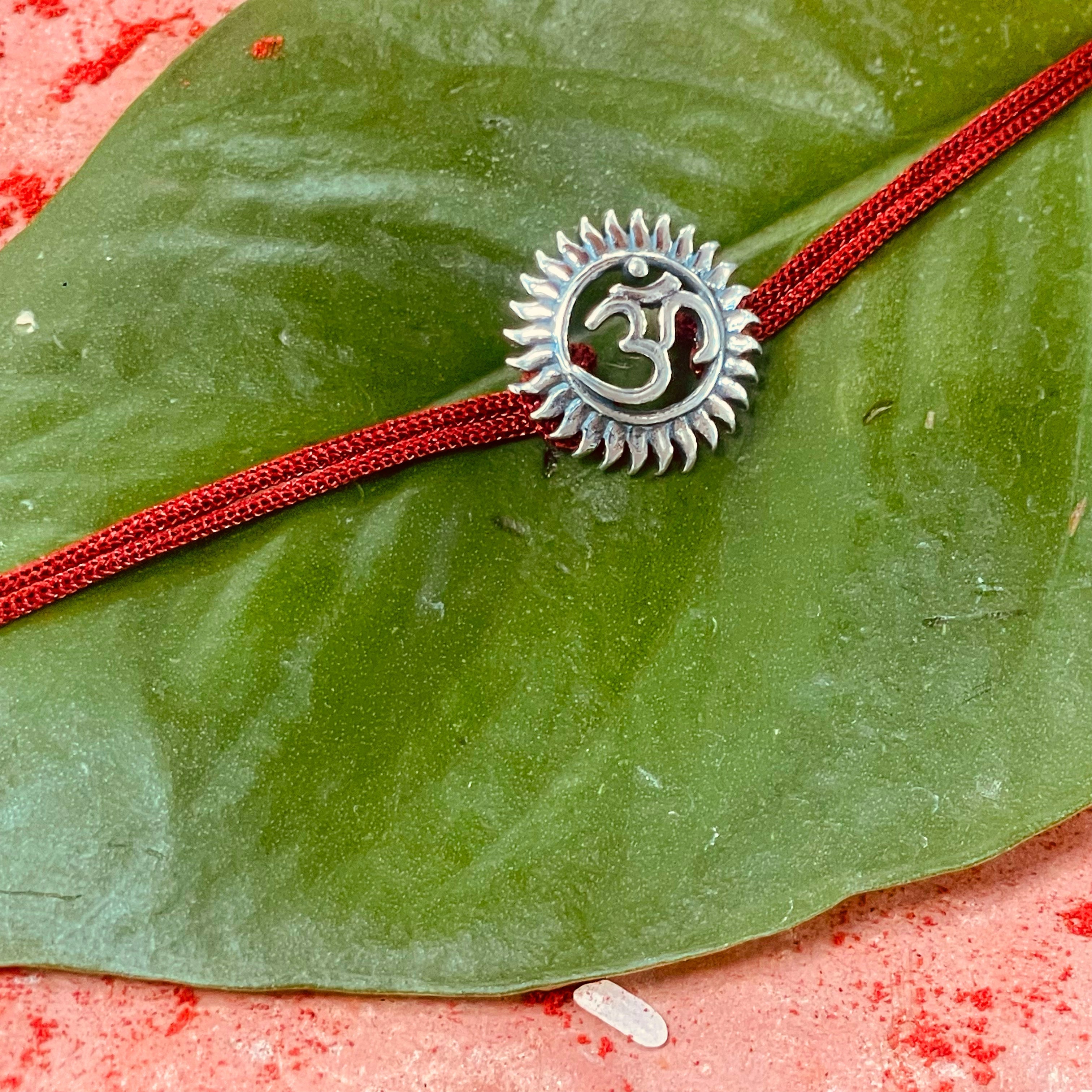 trueBrowns Sterling Silver Om Thread Rakhi | Grocsy