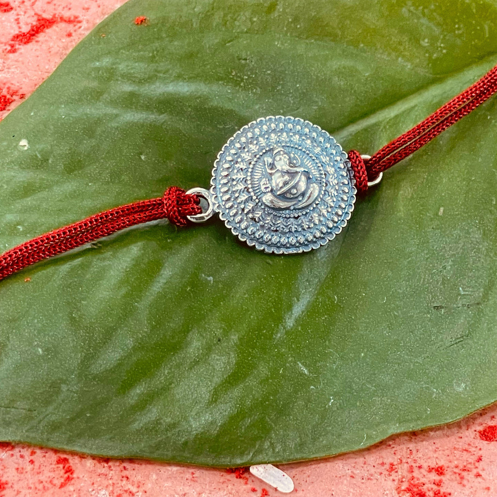 trueBrowns 925 Sterling Silver Embossed Ganesh Idol Thread Rakhi | Grocsy