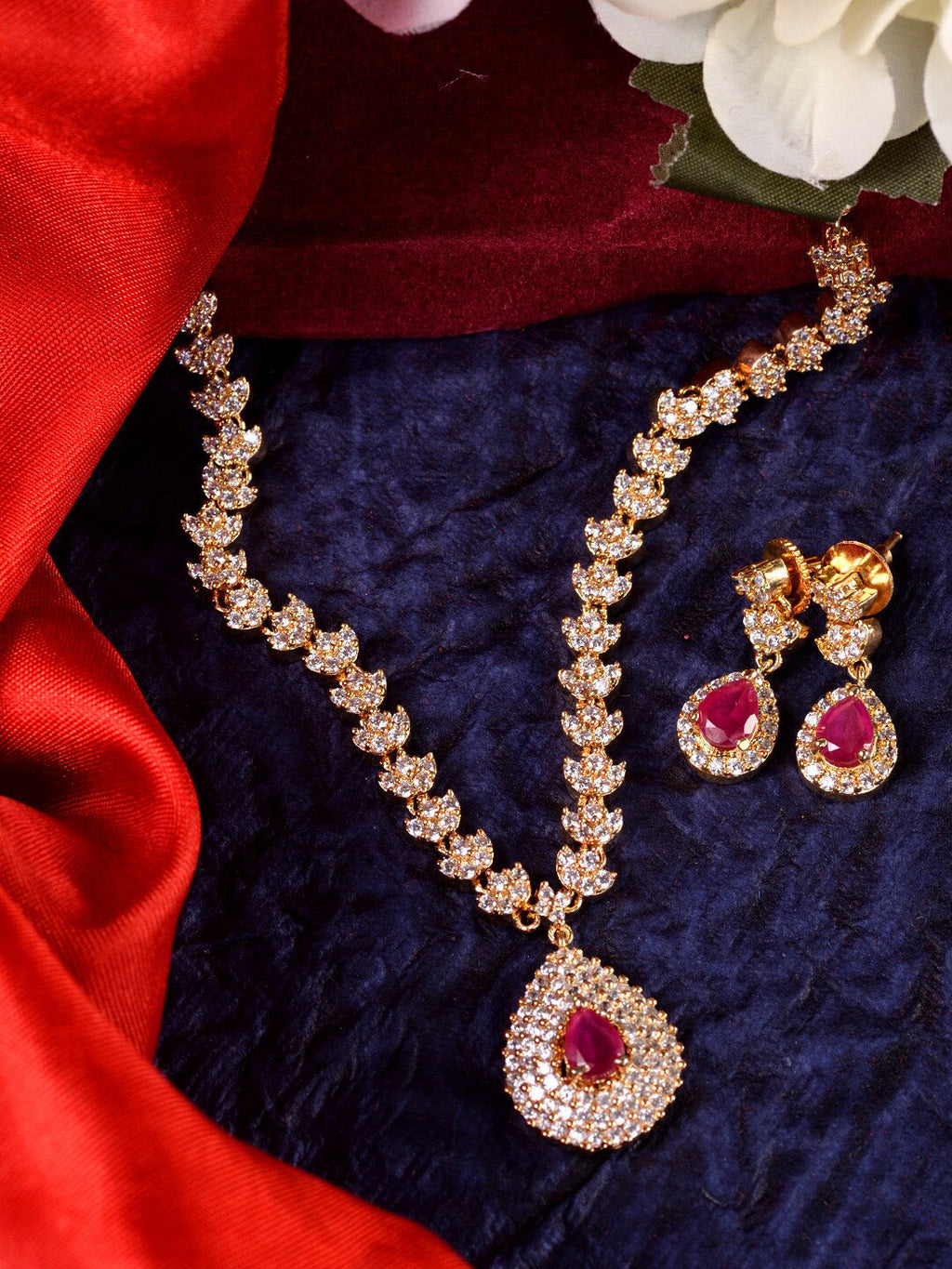 Saraf RS Jewellery Gold-Polished White & Red American Diamond Studded & Beaded Handcrafted Jewellery Set | Grocsy