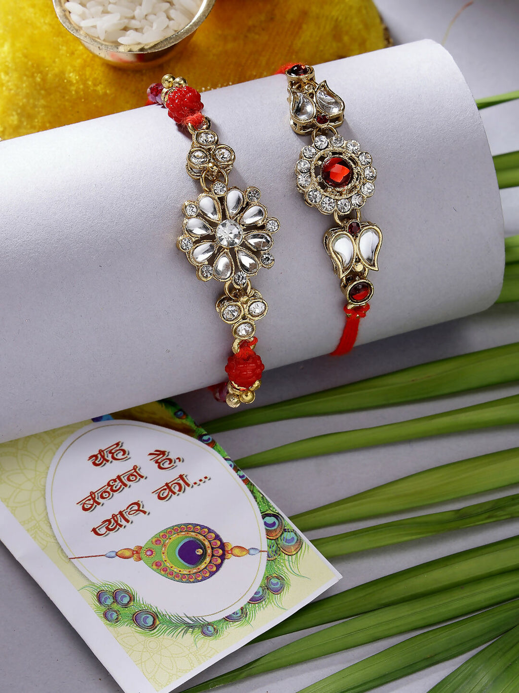 NVR Men Set of 2 Gold-Toned Stone-Studded Rakhi With Roli Chawal | Grocsy