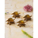 eCraftIndia 4 Pieces Beige Tortoise Statue Leaf Design Diyas | Grocsy