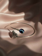 NVR Women Rhodium Plated Evil Eye Kada Bracelet | Grocsy