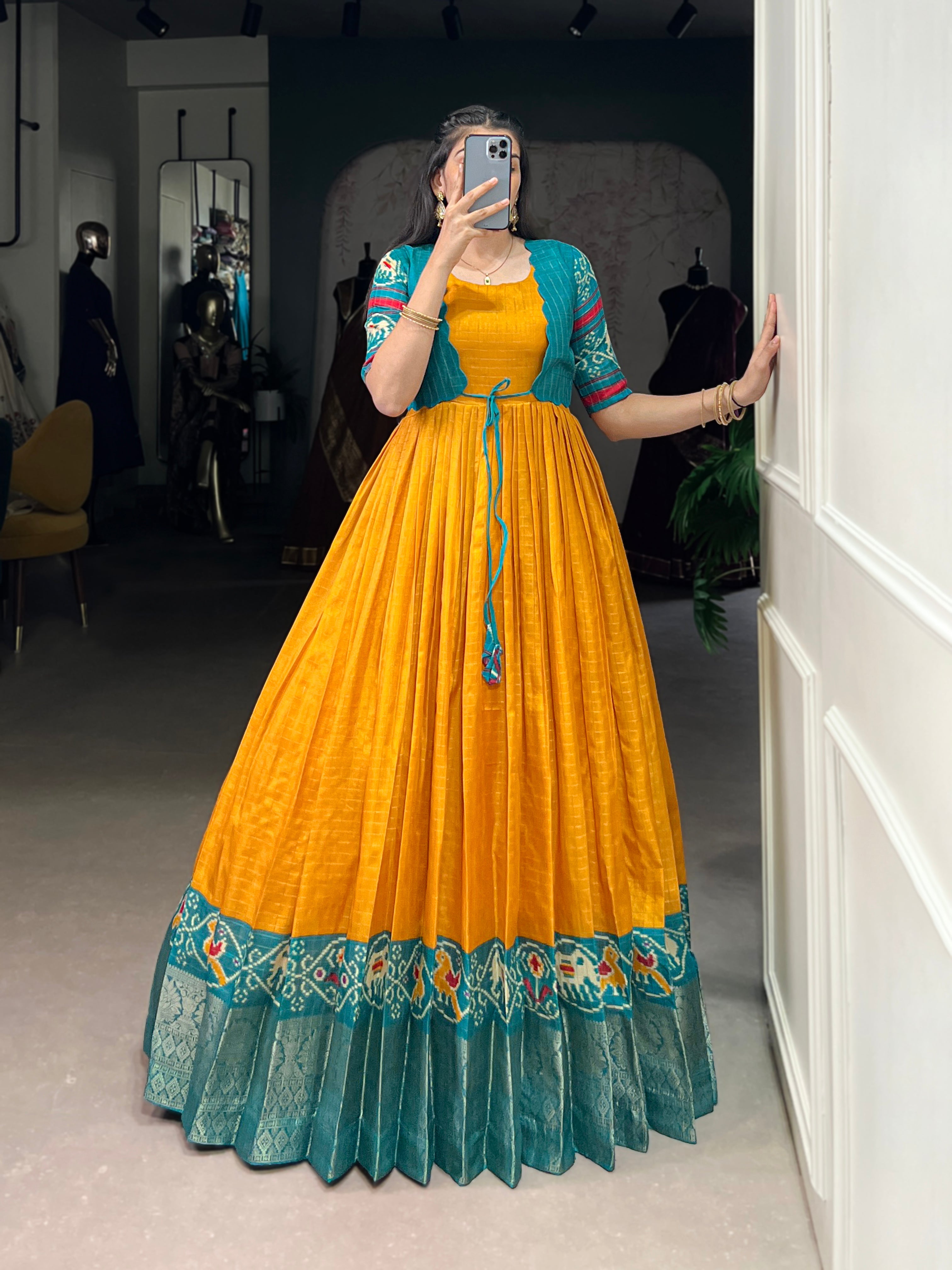 Lorenvalley Fashion Mustard Tussar Chex Patola Print With Weaving Work Border Gown with Koti | Grocsy