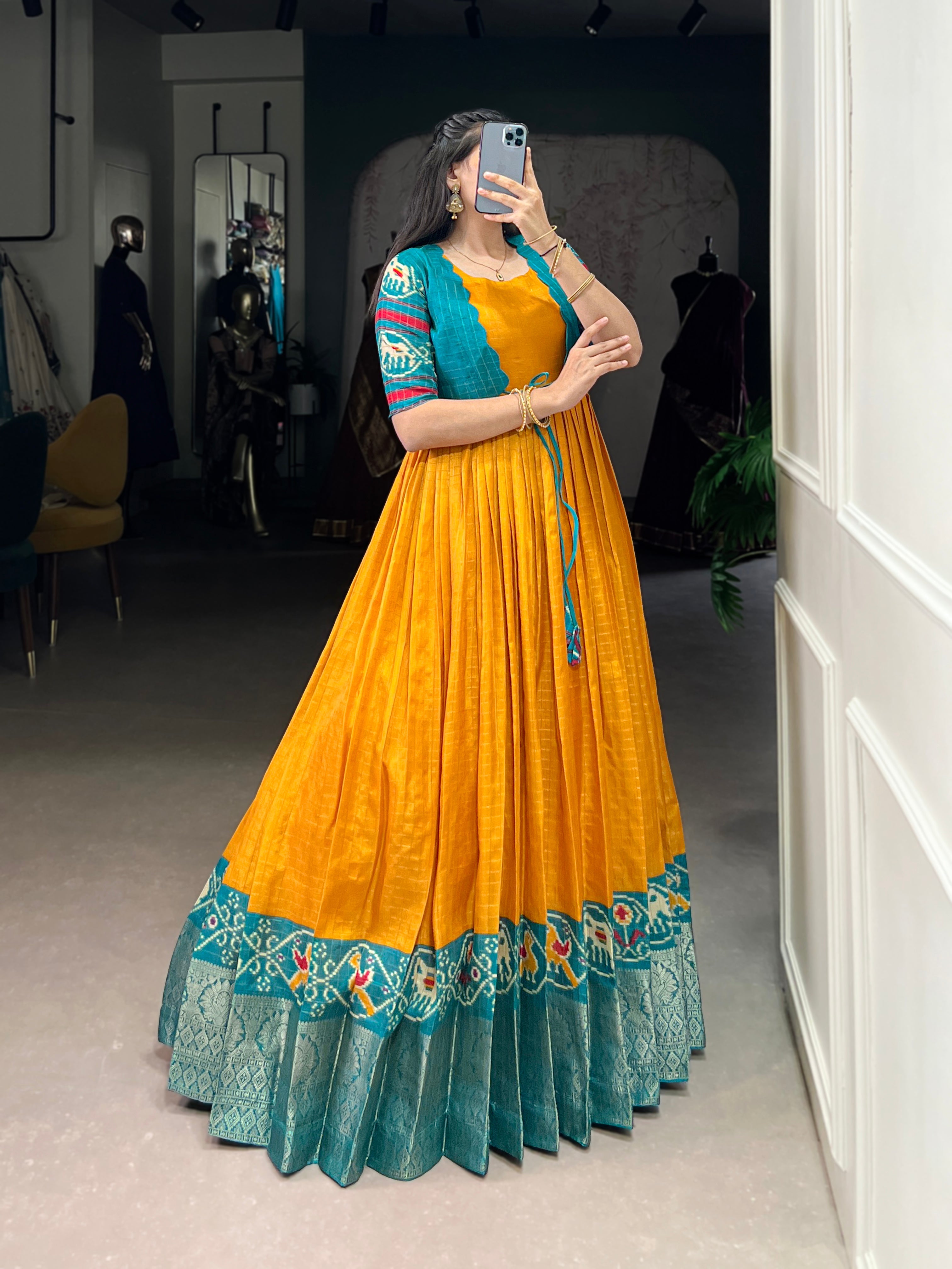 Lorenvalley Fashion Mustard Tussar Chex Patola Print With Weaving Work Border Gown with Koti | Grocsy