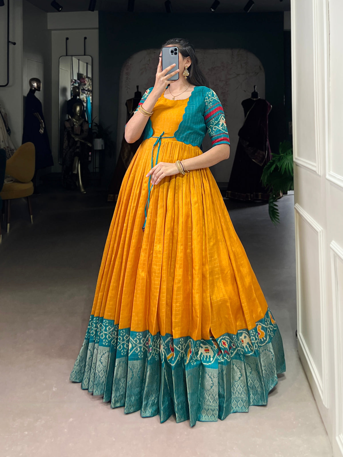 Lorenvalley Fashion Mustard Tussar Chex Patola Print With Weaving Work Border Gown with Koti | Grocsy