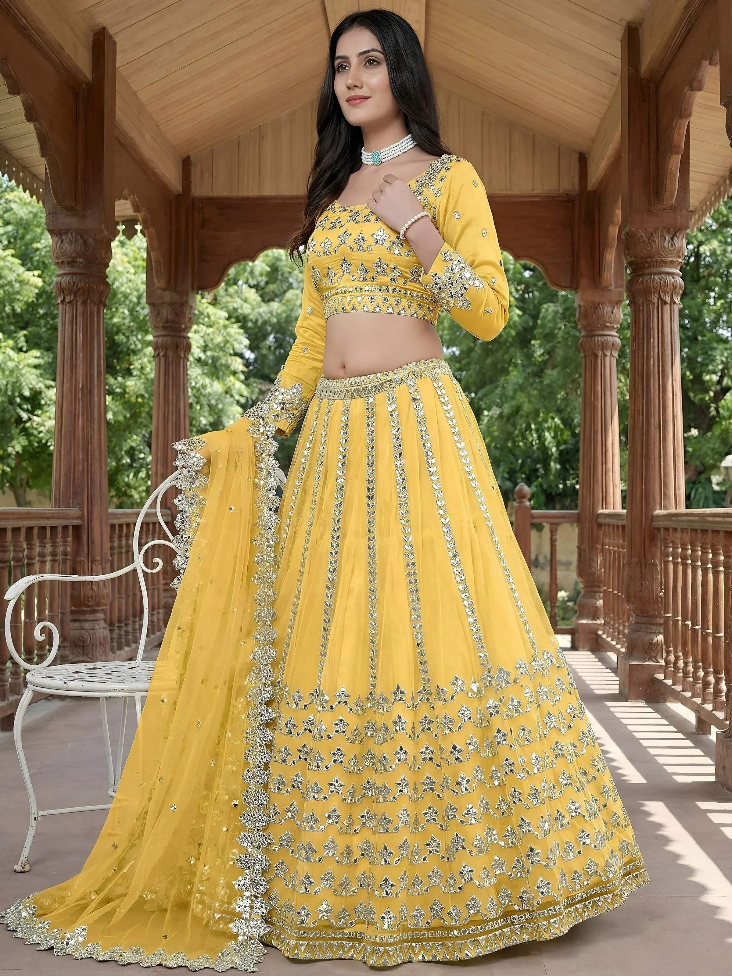 Tulsi Art Captivating Yellow Foil Work Net Sangeet Wear Lehenga Choli | Grocsy