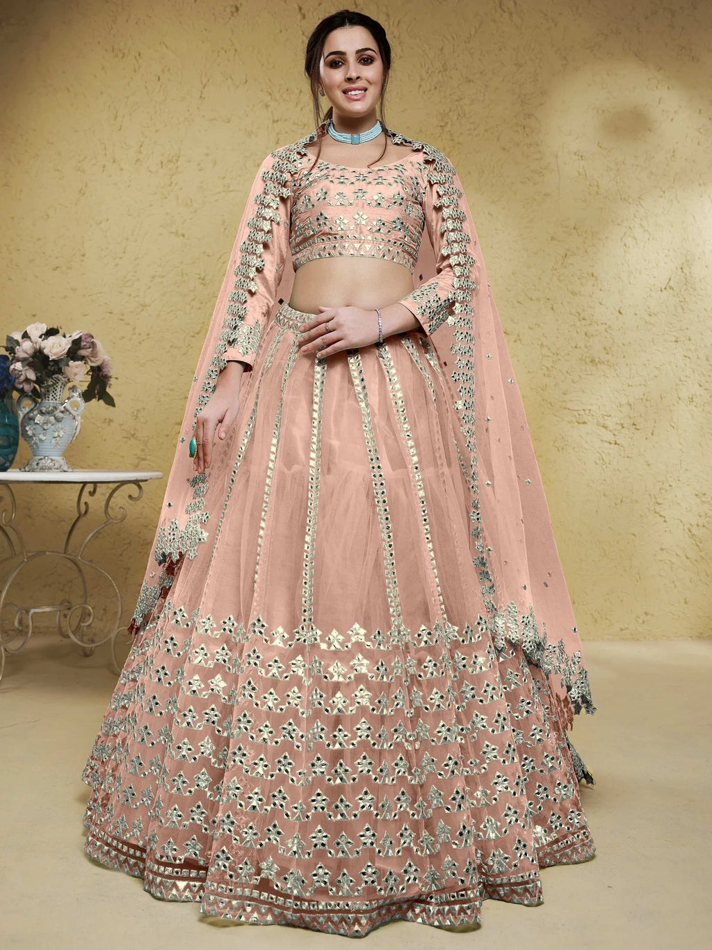 Tulsi Art Fascinating Dusty Pink Foil Work Net Bridesmaid Lehenga Choli | Grocsy