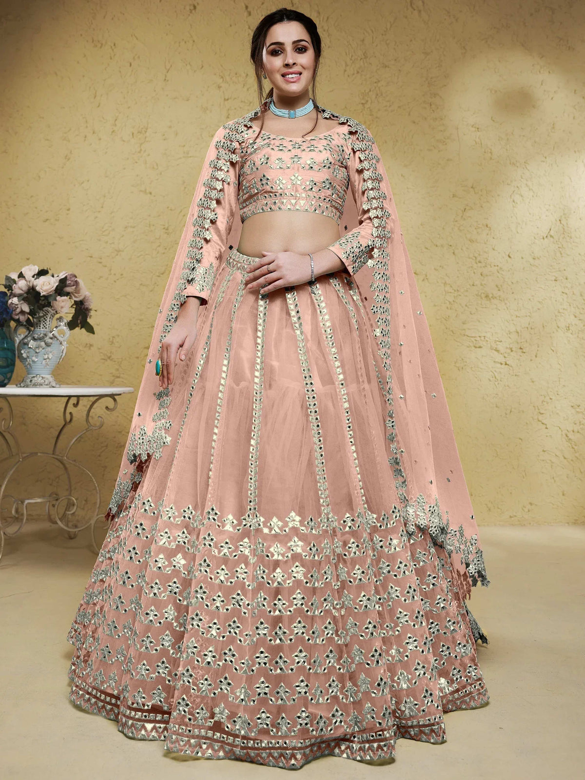 Tulsi Art Fascinating Dusty Pink Foil Work Net Bridesmaid Lehenga Choli | Grocsy