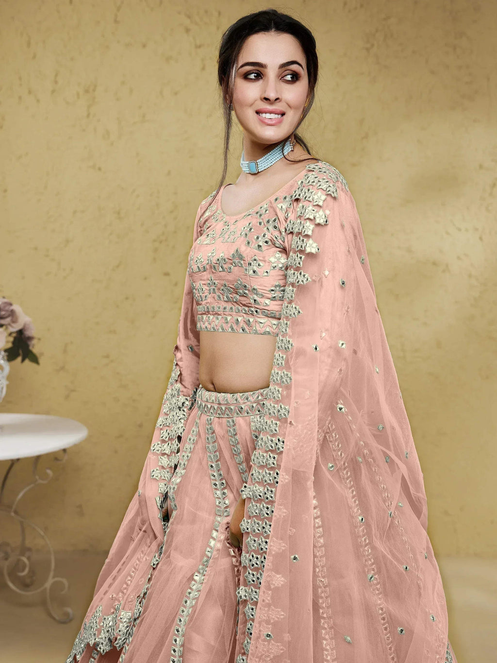 Tulsi Art Fascinating Dusty Pink Foil Work Net Bridesmaid Lehenga Choli | Grocsy