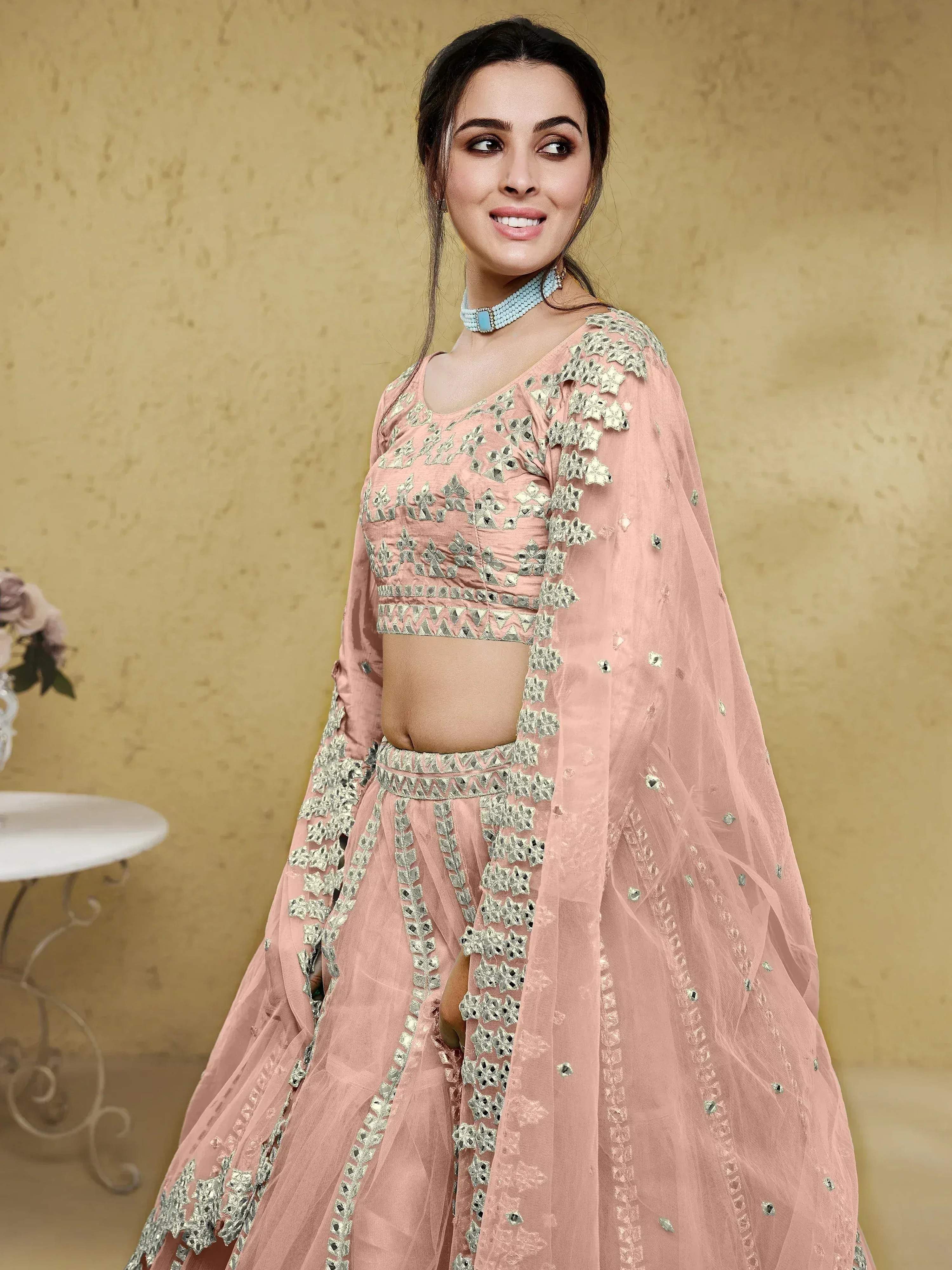 Tulsi Art Fascinating Dusty Pink Foil Work Net Bridesmaid Lehenga Choli | Grocsy