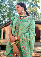 Monjolika Fashion Sea Green Colour Banarasi Silk Embroidered Woven Saree With Blouse | Grocsy