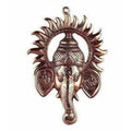 Black Metal Ganesh Ji Face Encircled With Suraj Ji Wall Hanging | Grocsy