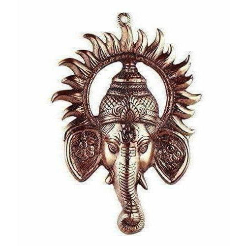 Black Metal Ganesh Ji Face Encircled With Suraj Ji Wall Hanging | Grocsy