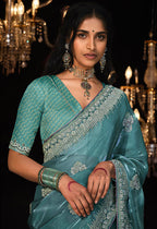 Monjolika Fashion Teal Blue Colour Tissue Silk Embroidered Saree | Grocsy