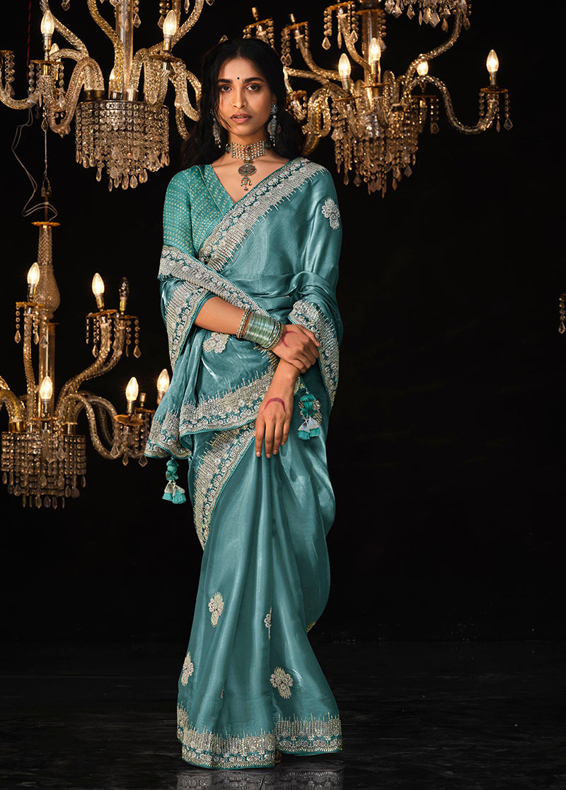Monjolika Fashion Teal Blue Colour Tissue Silk Embroidered Saree | Grocsy