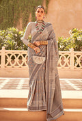 Monjolika Fashion Raw Silk Beige Foil Print Contemporary Saree | Grocsy