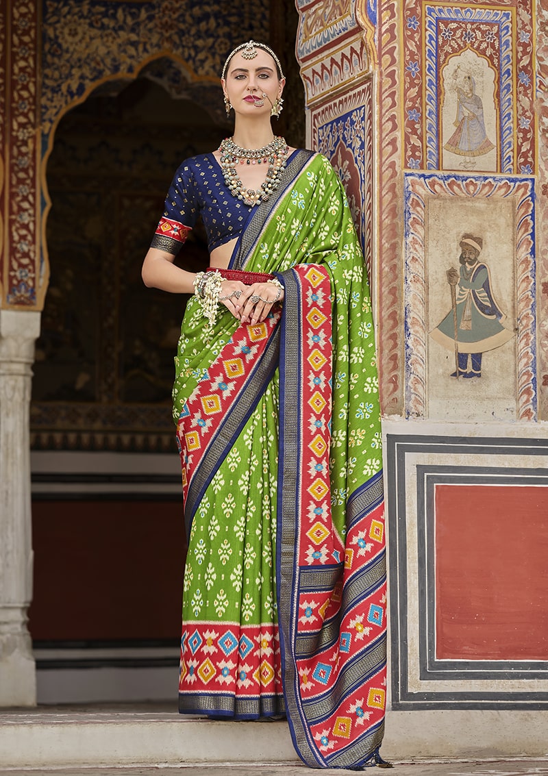 Monjolika Fashion Parrot Green And Red Patola Print Silk Festival Trendy Saree | Grocsy