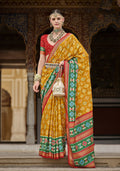 Monjolika Fashion Mustard And Green Patola Print Silk Festival Trendy Saree | Grocsy