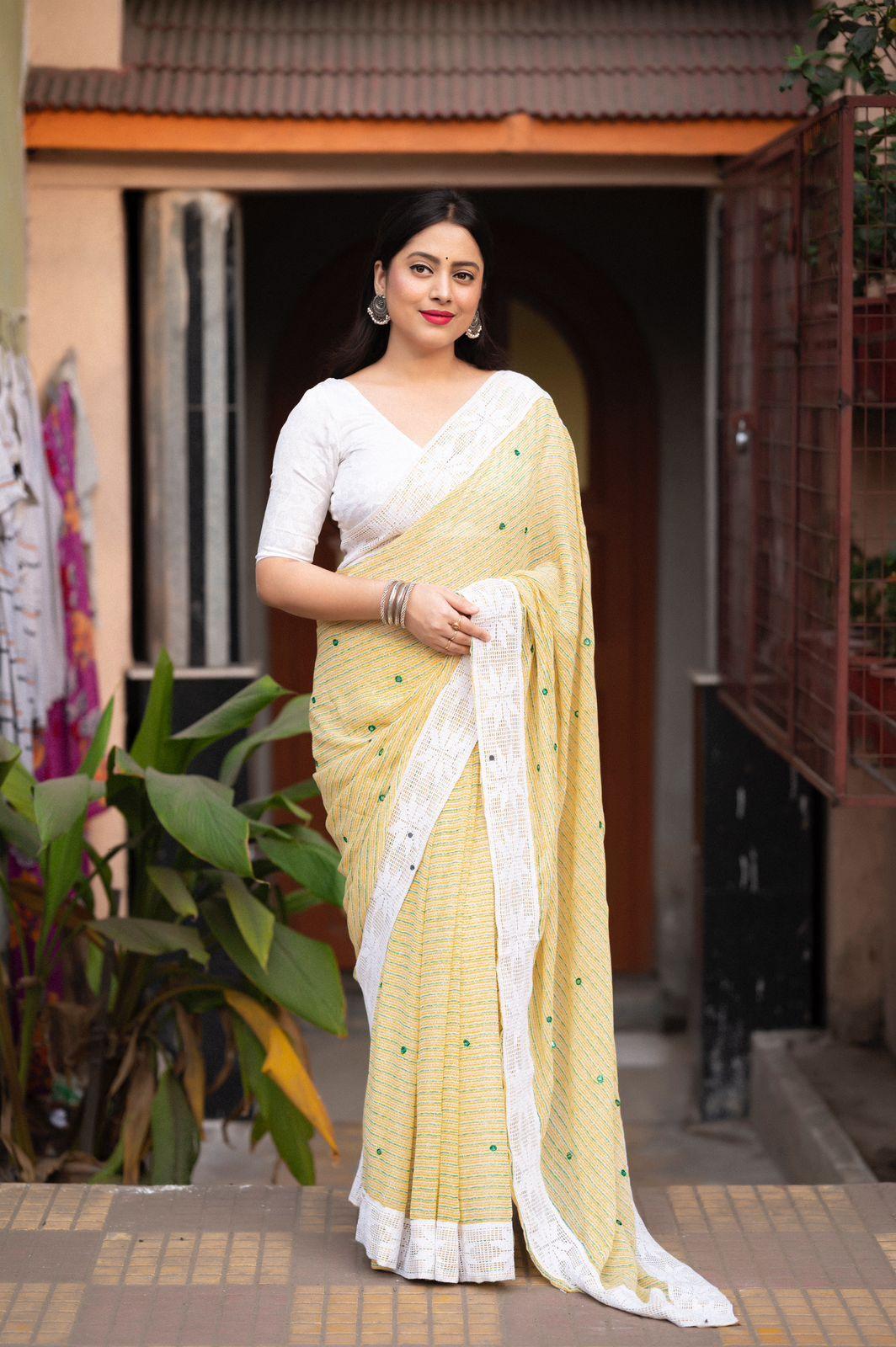 Lemon Poly Georgette Ethnic Motifs Saree with Unstitched Blouse - Hiral Fashion | Grocsy