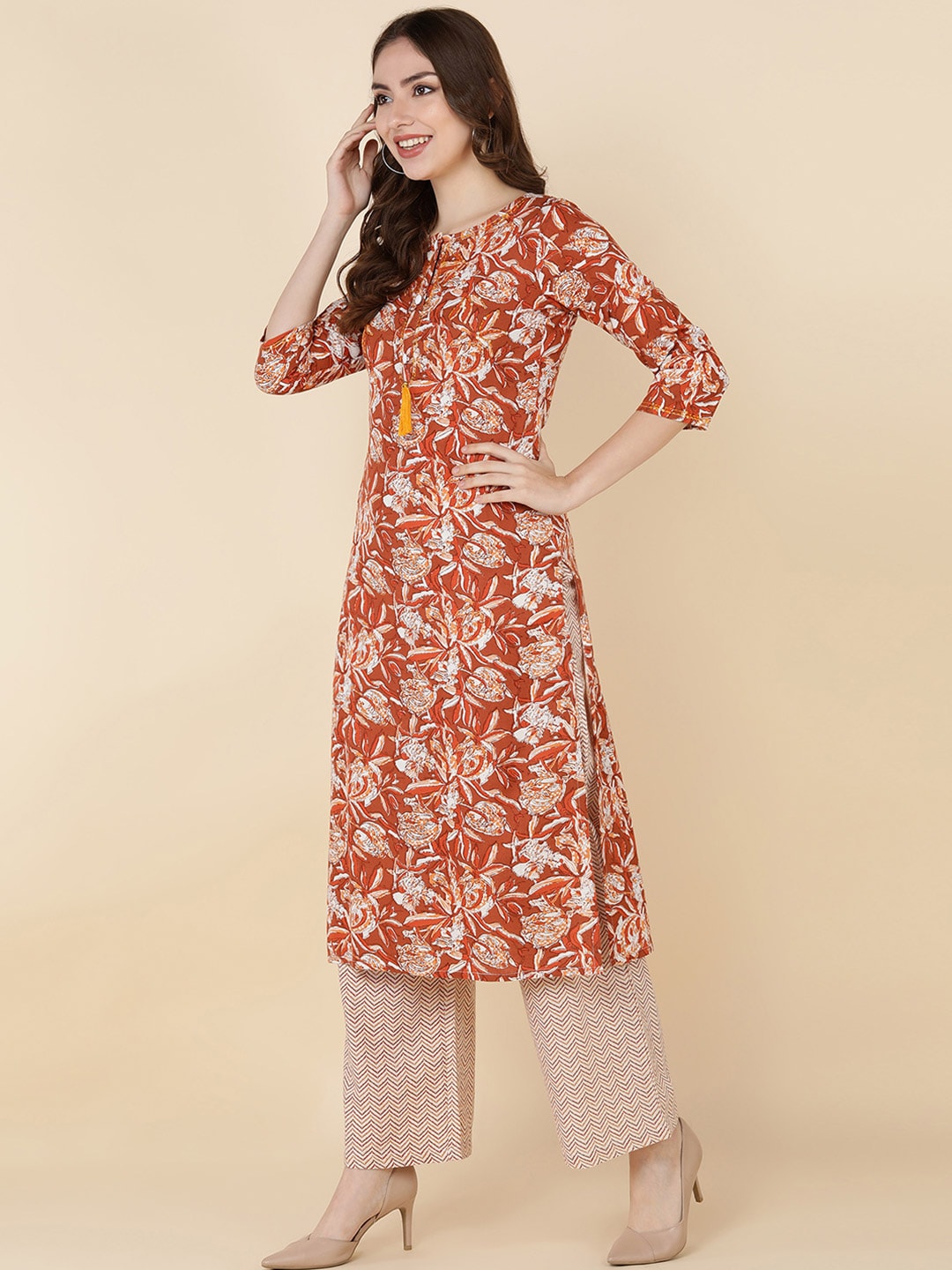 HERE&NOW Women Brown Floral Printed Sequinned Kurta with Trousers | Grocsy