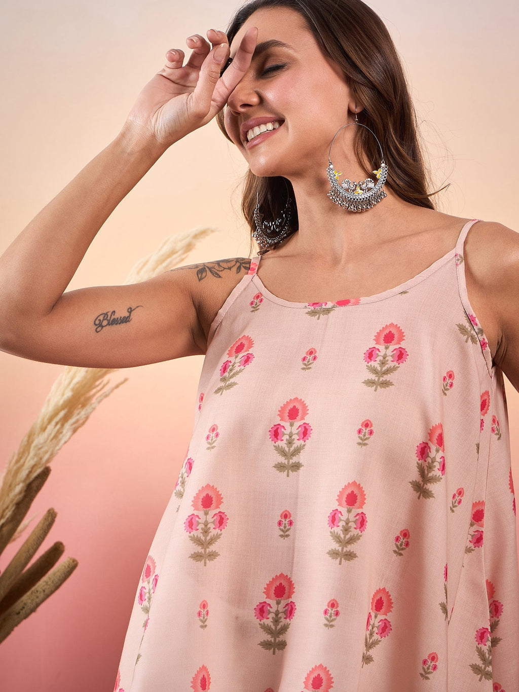 InWeave Light Peach Floral Strappe Flare Top | Grocsy