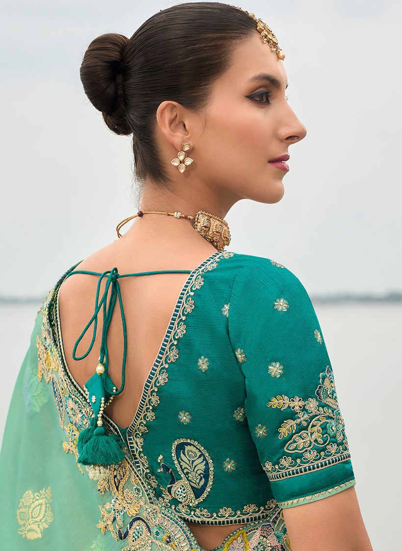 Monjolika Fashion Turquoise Viscose Tissue Silk Saree With Embroidery & Cutwork Border | Grocsy