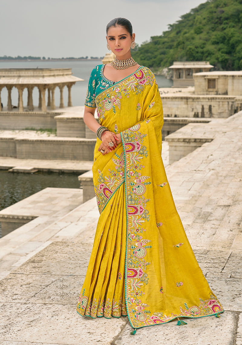 Monjolika Fashion Yellow Color Banarasi Silk Blend Embroidered With Heavy Patchwork Border Saree With Contrast Blouse | Grocsy