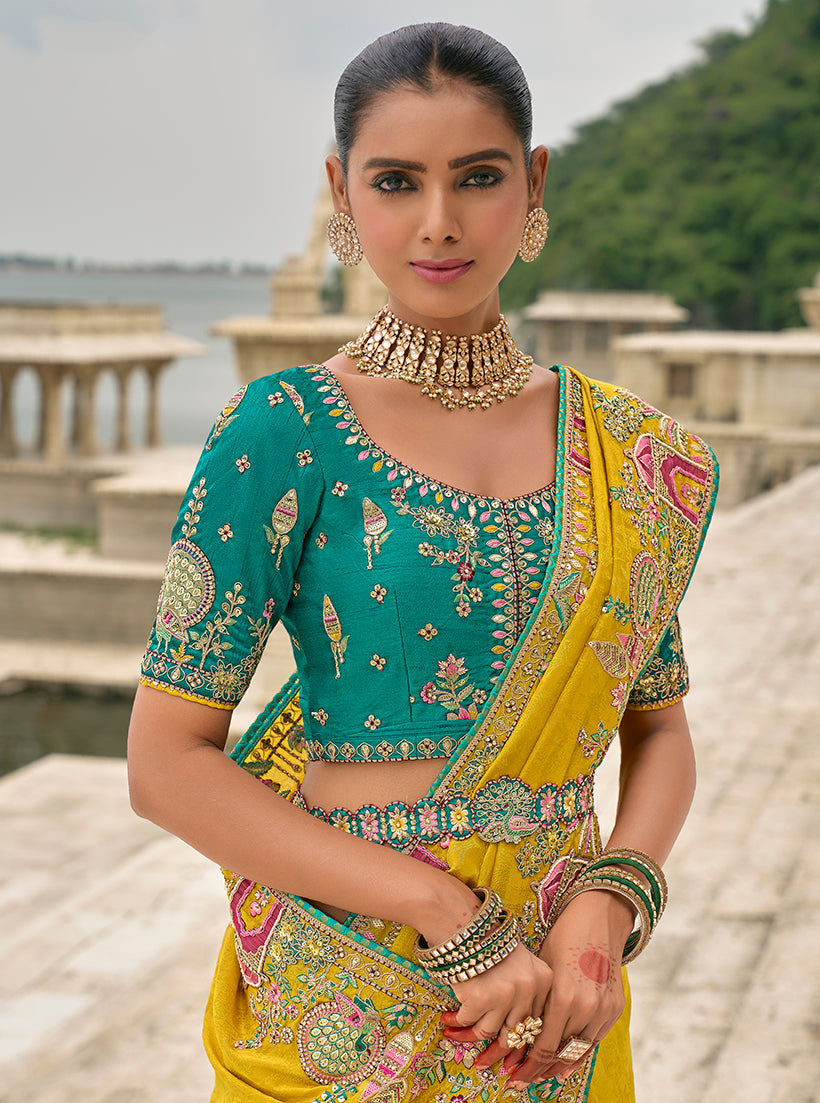 Monjolika Fashion Yellow Color Banarasi Silk Blend Embroidered With Heavy Patchwork Border Saree With Contrast Blouse | Grocsy